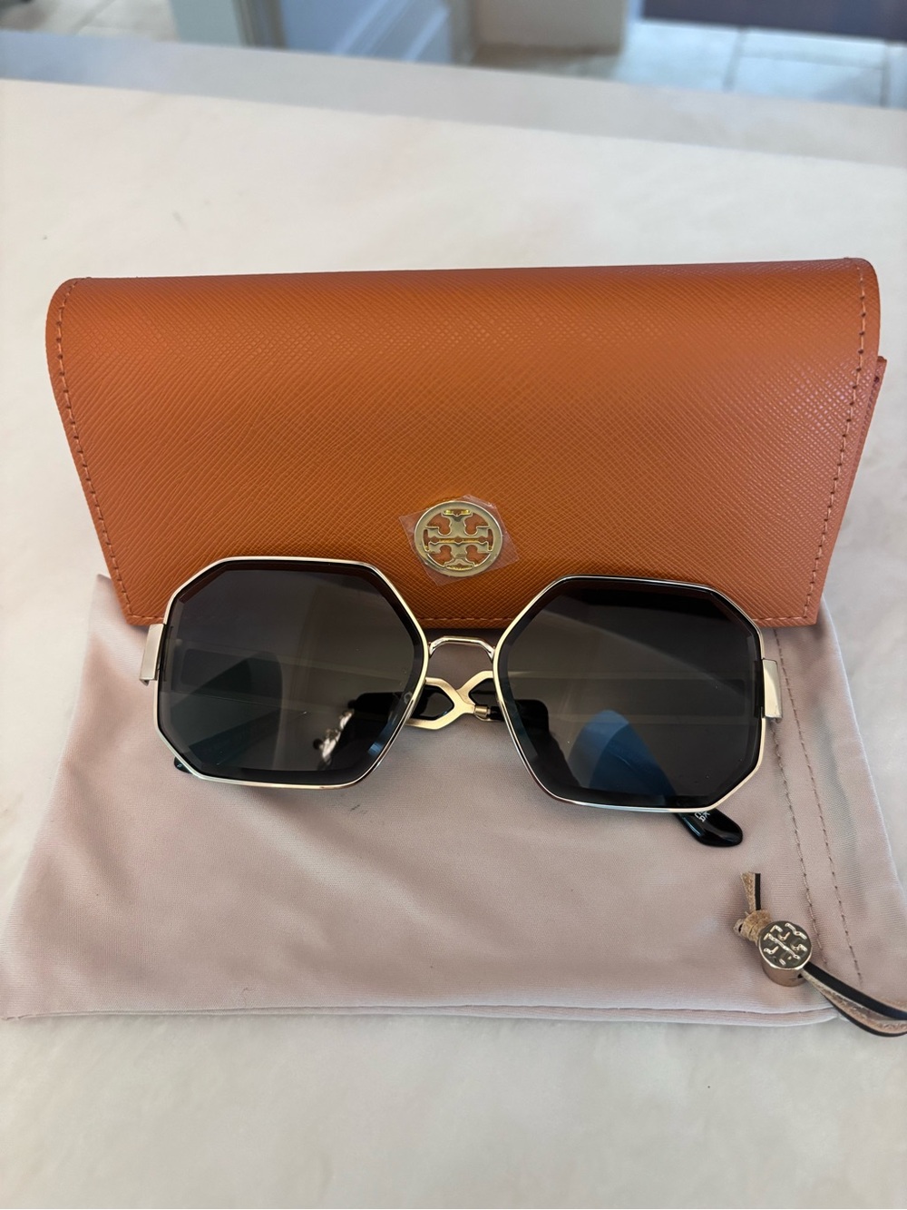 Tory Burch Octagonal Sunglasses in Black and Gold with Orange Case